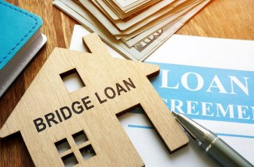Bridge loan and mortgage agreement with pen.