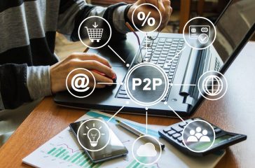 Businessman presses button p2p peer-to-peer on virtual electronic user interface.