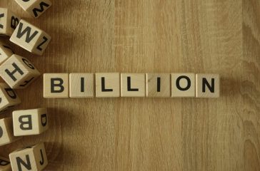Billion word from wooden blocks on desk