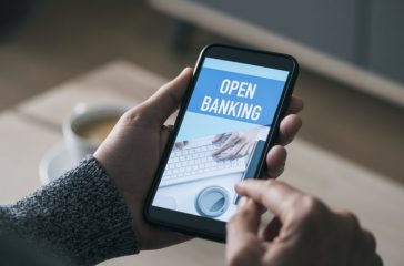 has smartphone with text open banking in screen